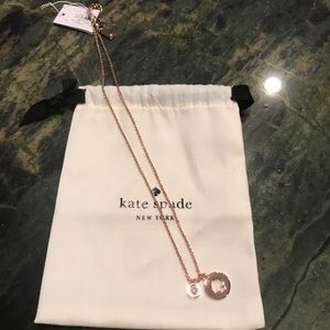 Late Spade Rose gold necklace.